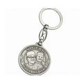 Silver round metal key ring featuring Obi Kwankwaso design.