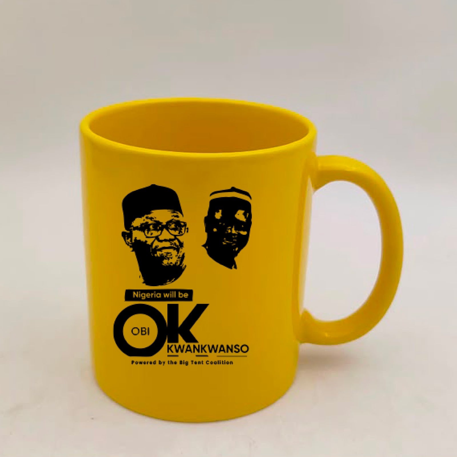 Yellow ceramic mug featuring the Obi Kwankwaso campaign design
